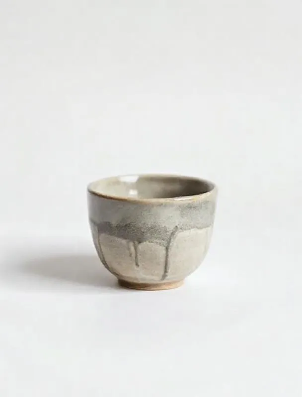 A handleless Kiln cup in grey-celadon glaze