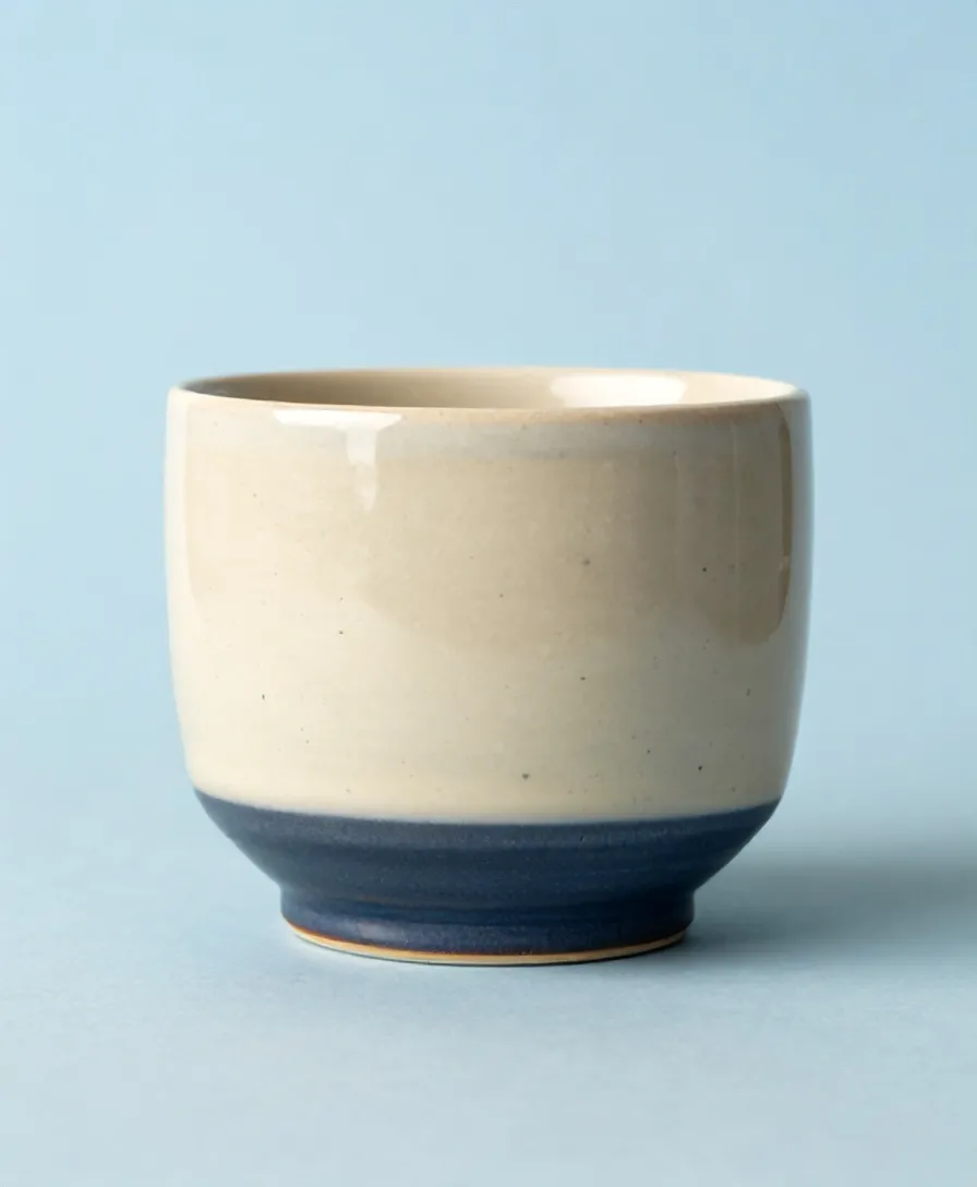 Speckled cup wall with faint fingermarks