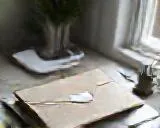 An envelope on a laptop